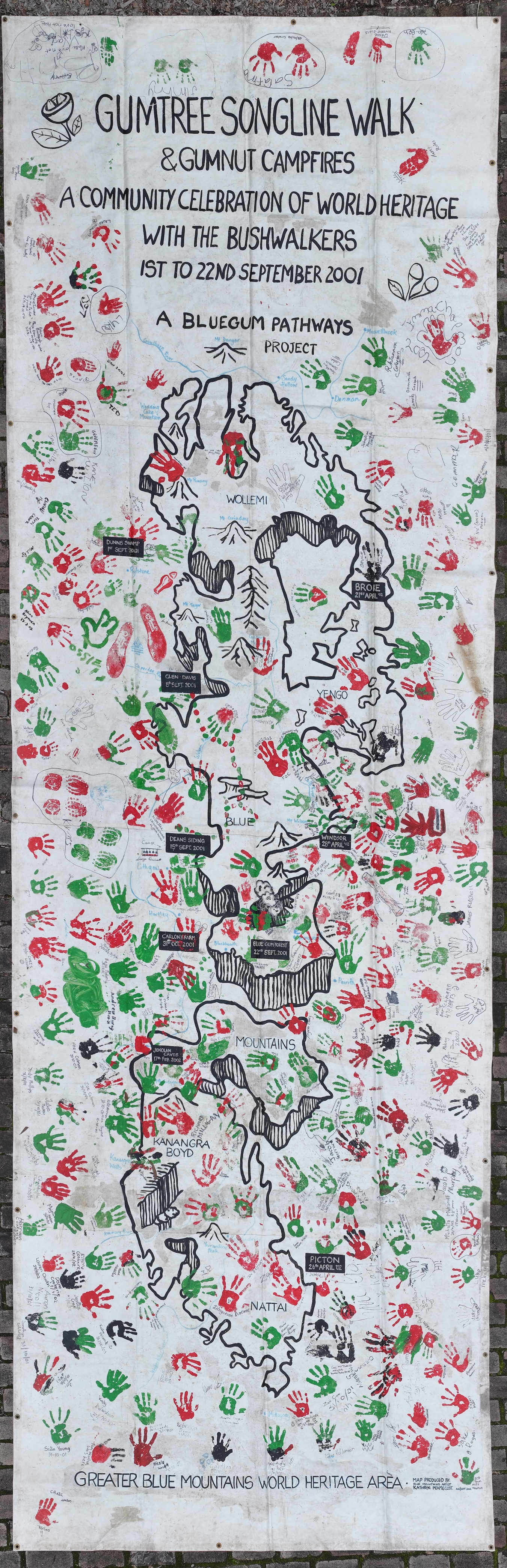 Songlines banner with the hands